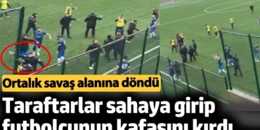 Taraftarlar sahaya girip futbolcunun kafasını kırdı. Ortalık savaş alanına döndü